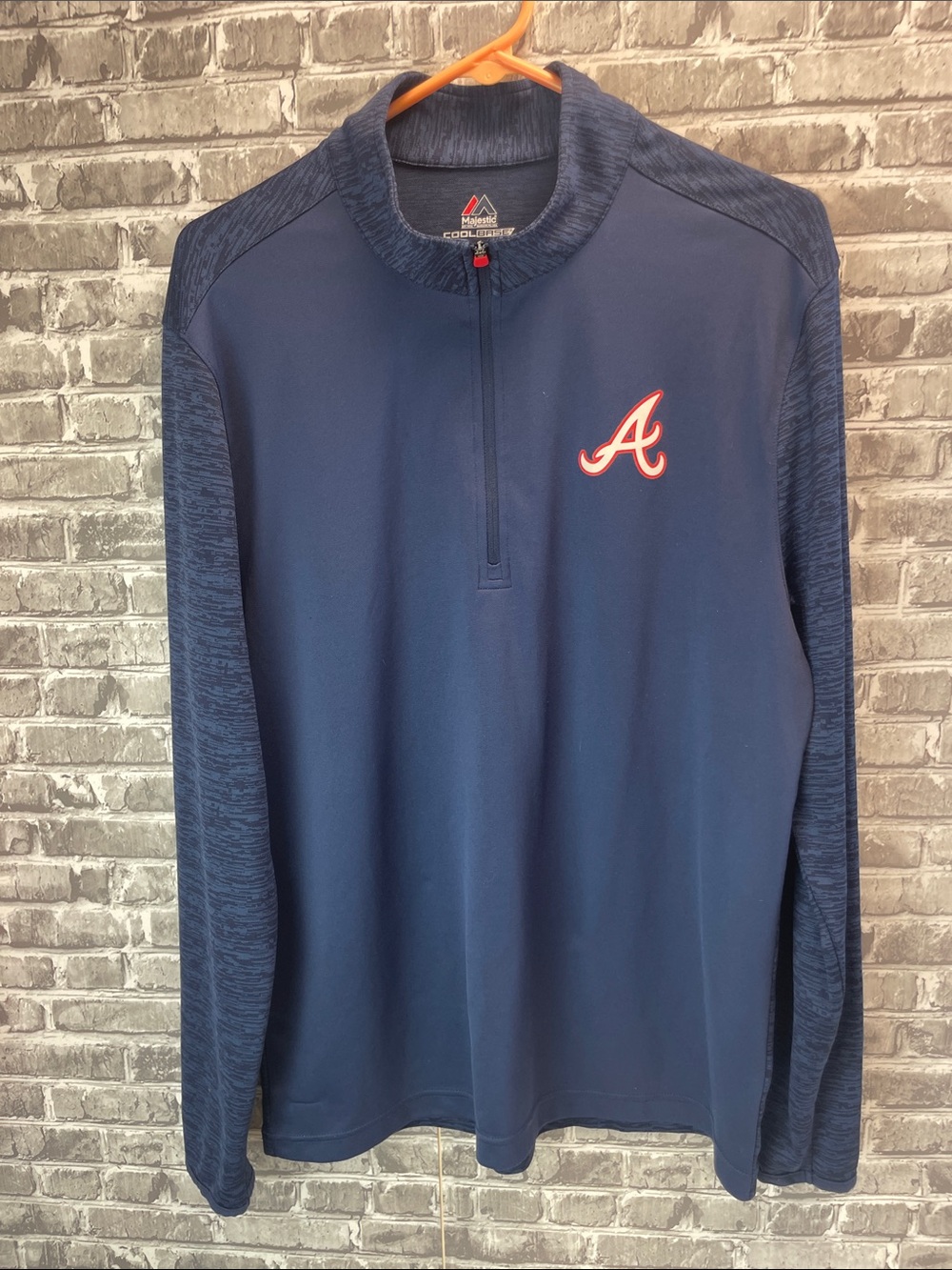 Atlanta Braves
Majestic Navy Pullover with Red Accent Logo